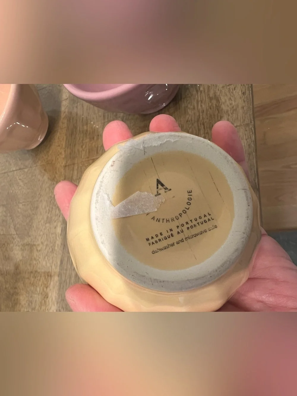3 Anthropologie glazed ceramic bowls in peach, yellow, and mauve
